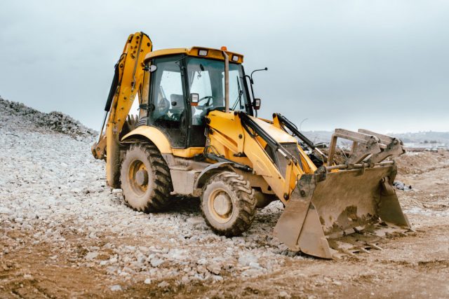 Backhoe Excavator and Bulldozer on Construction Site in Kununurra, WA